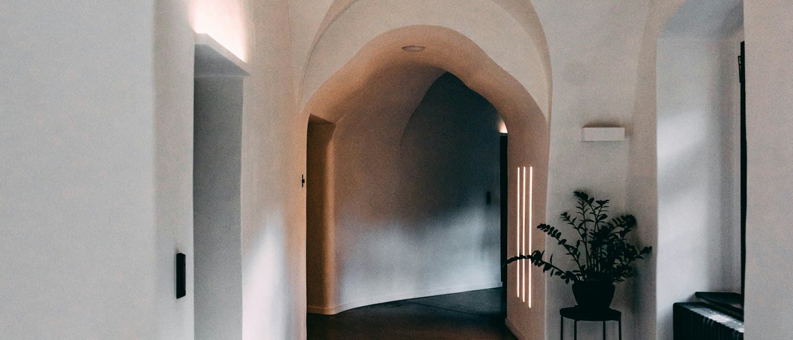 White plastered arched corridor