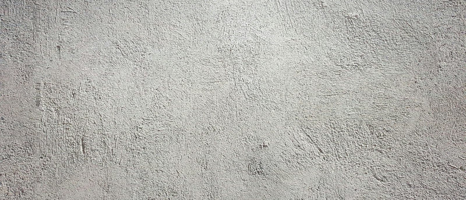 Close-up of a hand-troweled lime plaster wall