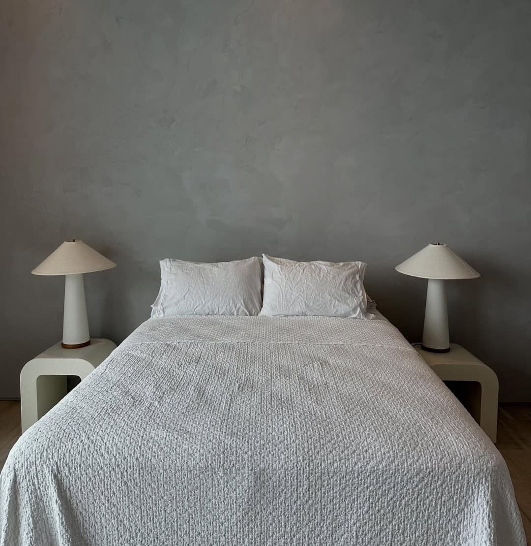 White Venetian plaster bedroom wall finish