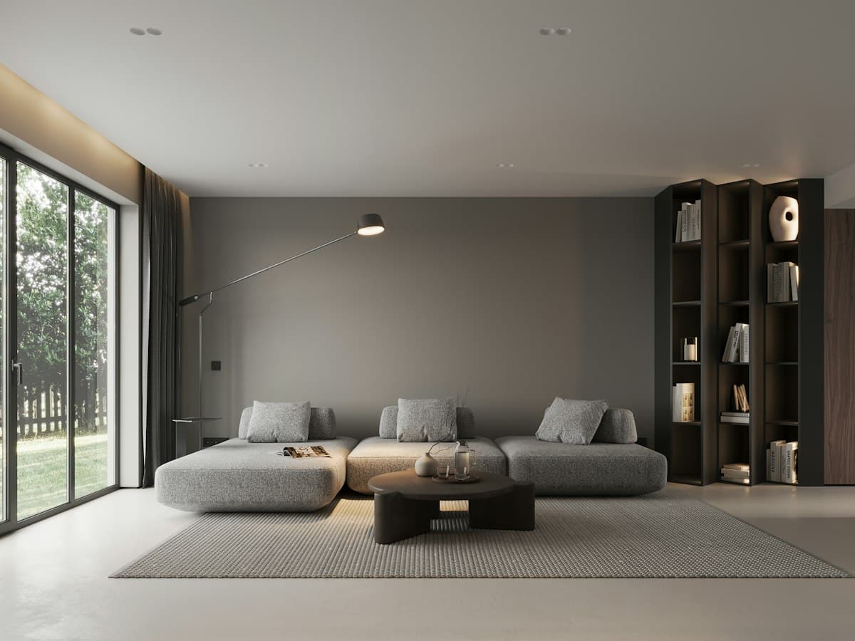 Minimal luxury living room with textured grey walls