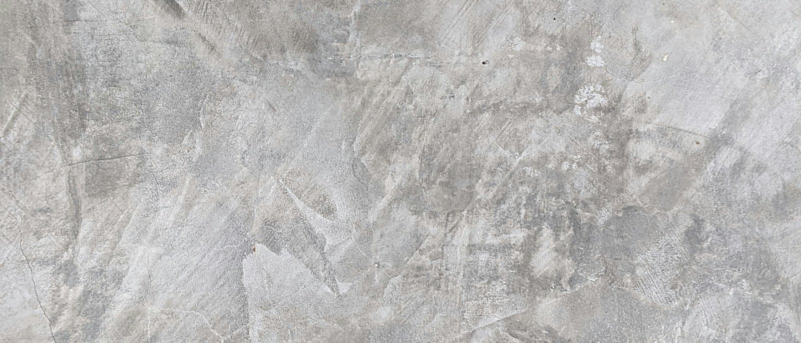 Grey plaster with visible trowel marks