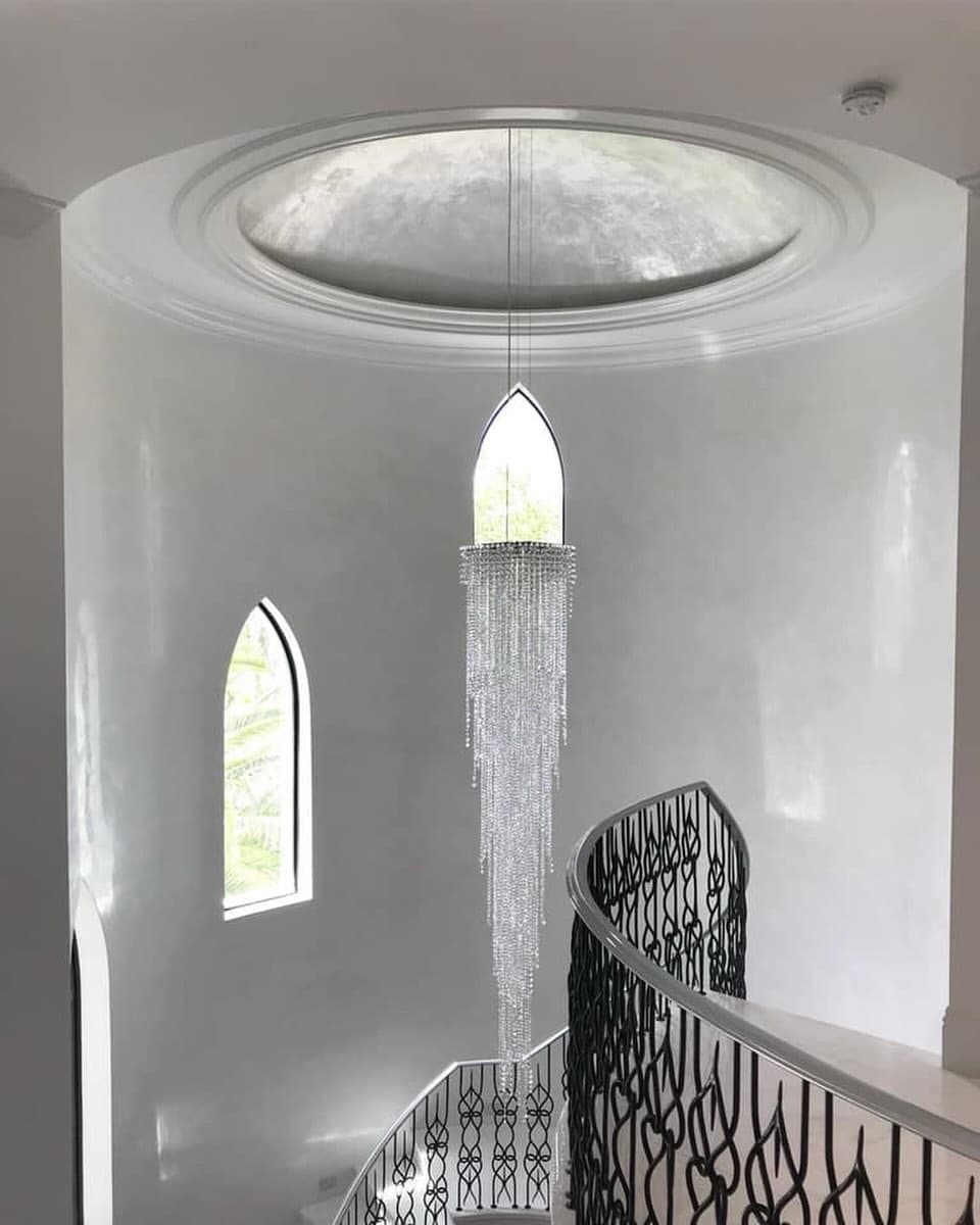 Curved staircase finished in polished Venetian plaster
